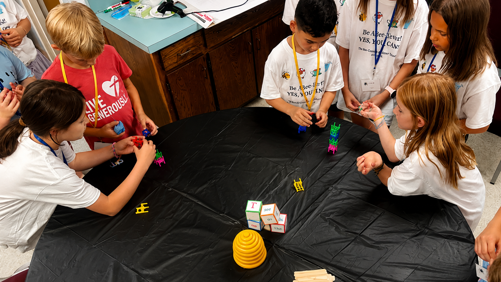 Students working together during the Bee-Conomy after-school program